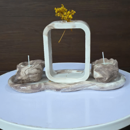 Rectangular vase with sea shell candles..